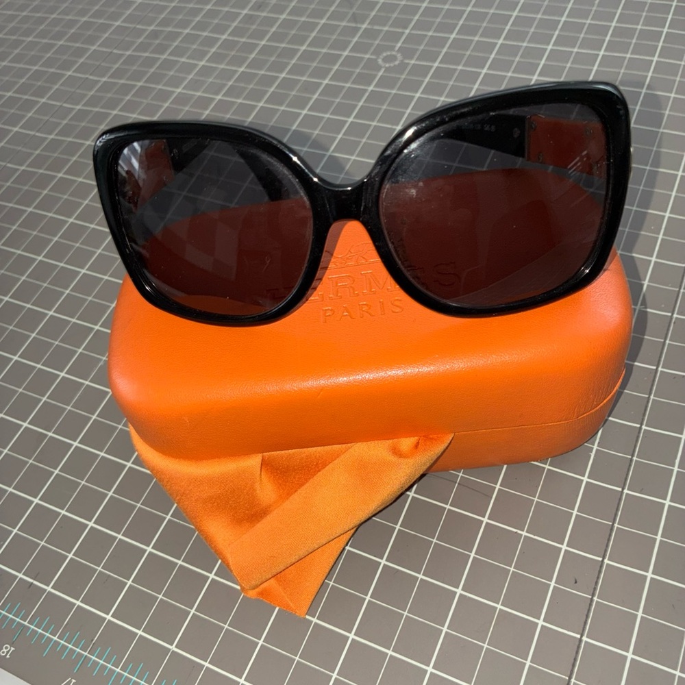 Stylish Black Sunglasses with Orange Case